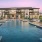 Sparkling swimming pool with Lush Landscaping