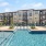 Sparkling swimming pool with Lush Landscaping